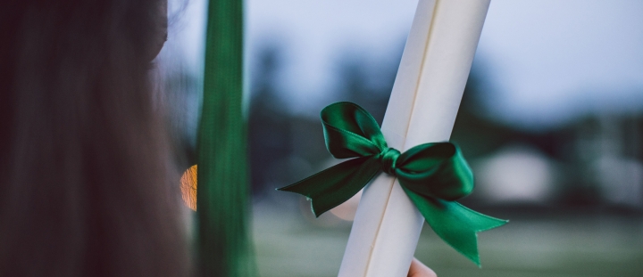 Scroll wrapped with Green bow