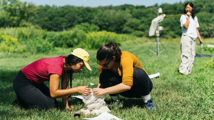 Theresa Ong and student in the field studying nature