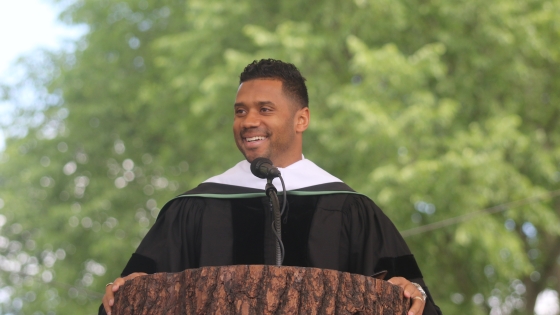 Russell Wilson speaking at Commencement 2022