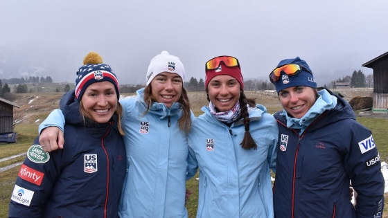 four skiers