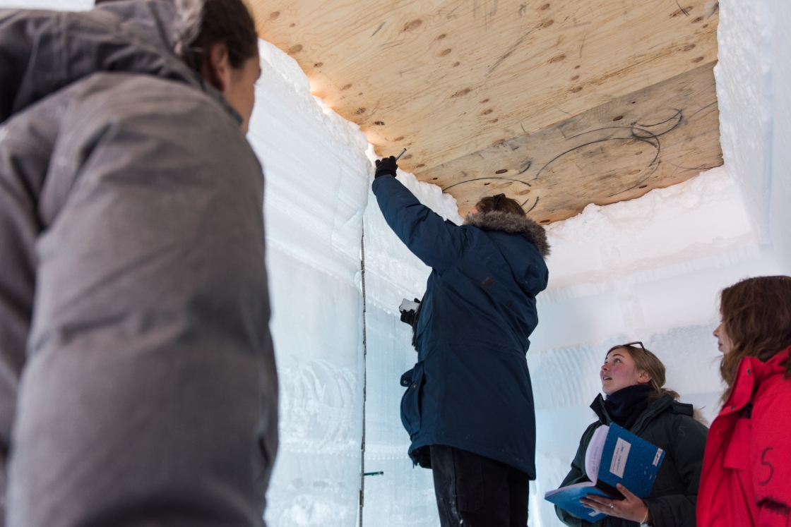 JSEP students take measurements in an ice cave.