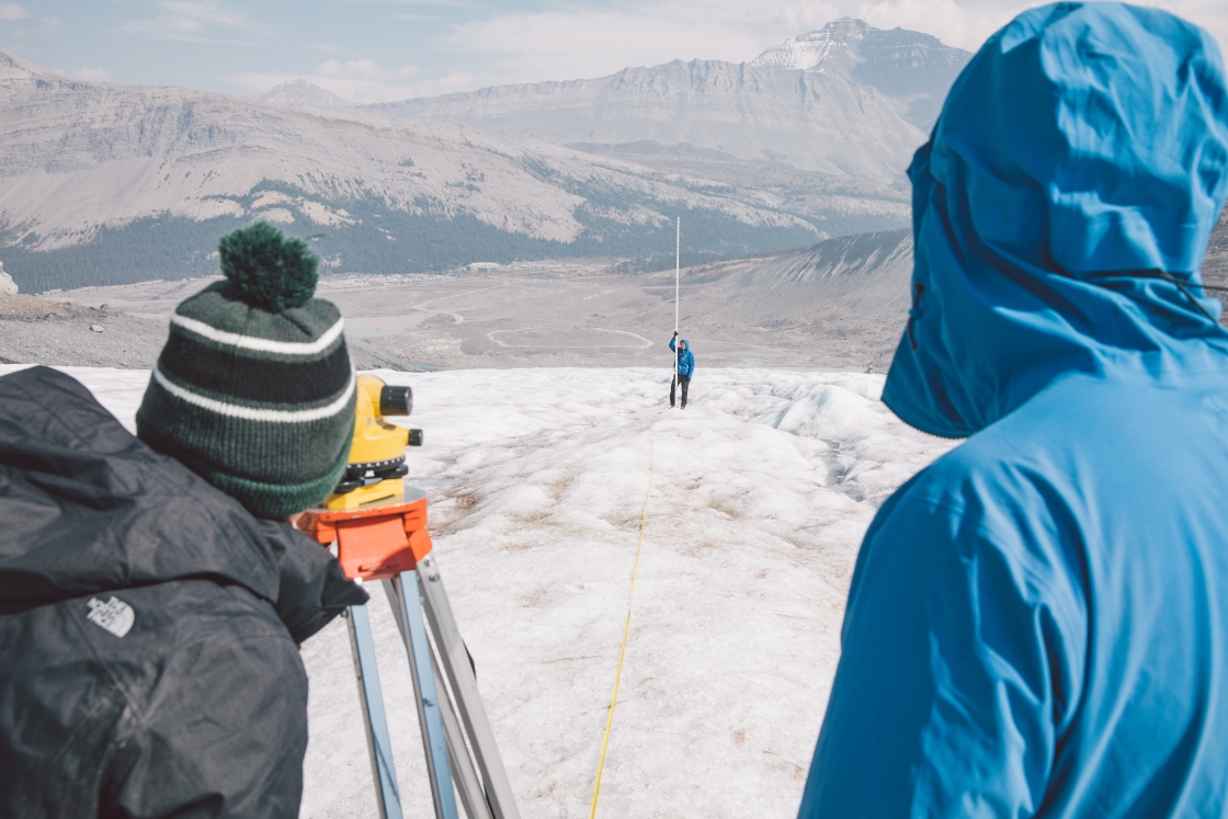 Students learning surveying techniques on the Athabasca Glacier in Banff National Park.