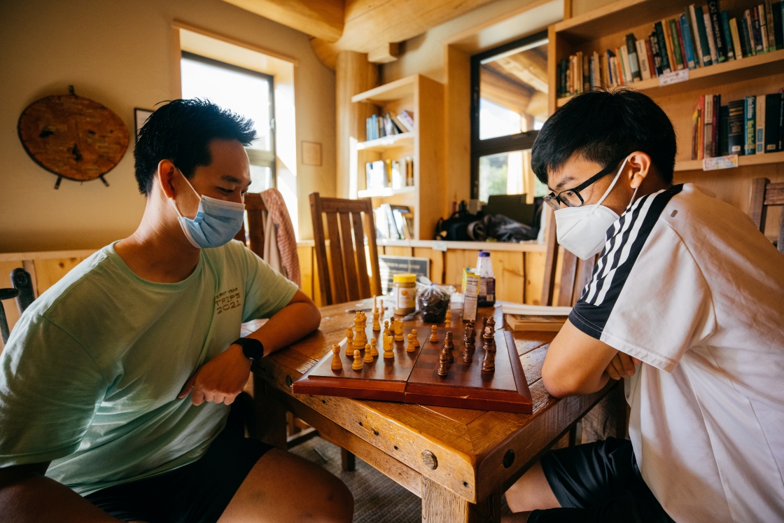 Students play chess during first-year trips