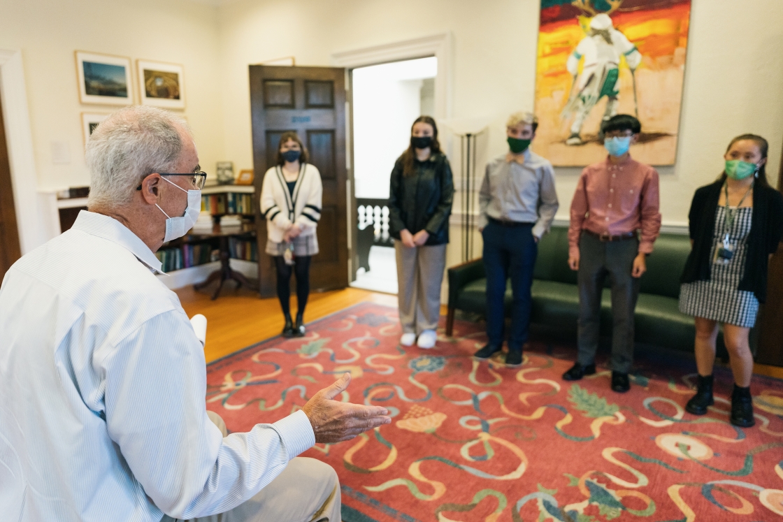 President Hanlon speaking with students in his office