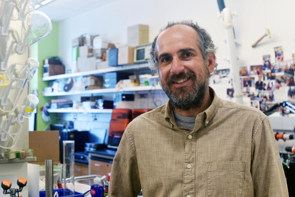 Associate Professor of Engineering Ryan Halter in his lab.