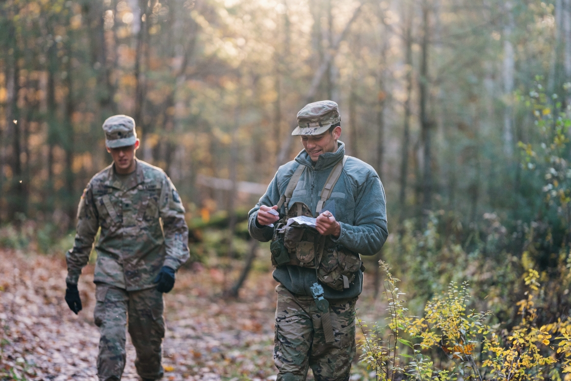 Two ROTC members in the woods
