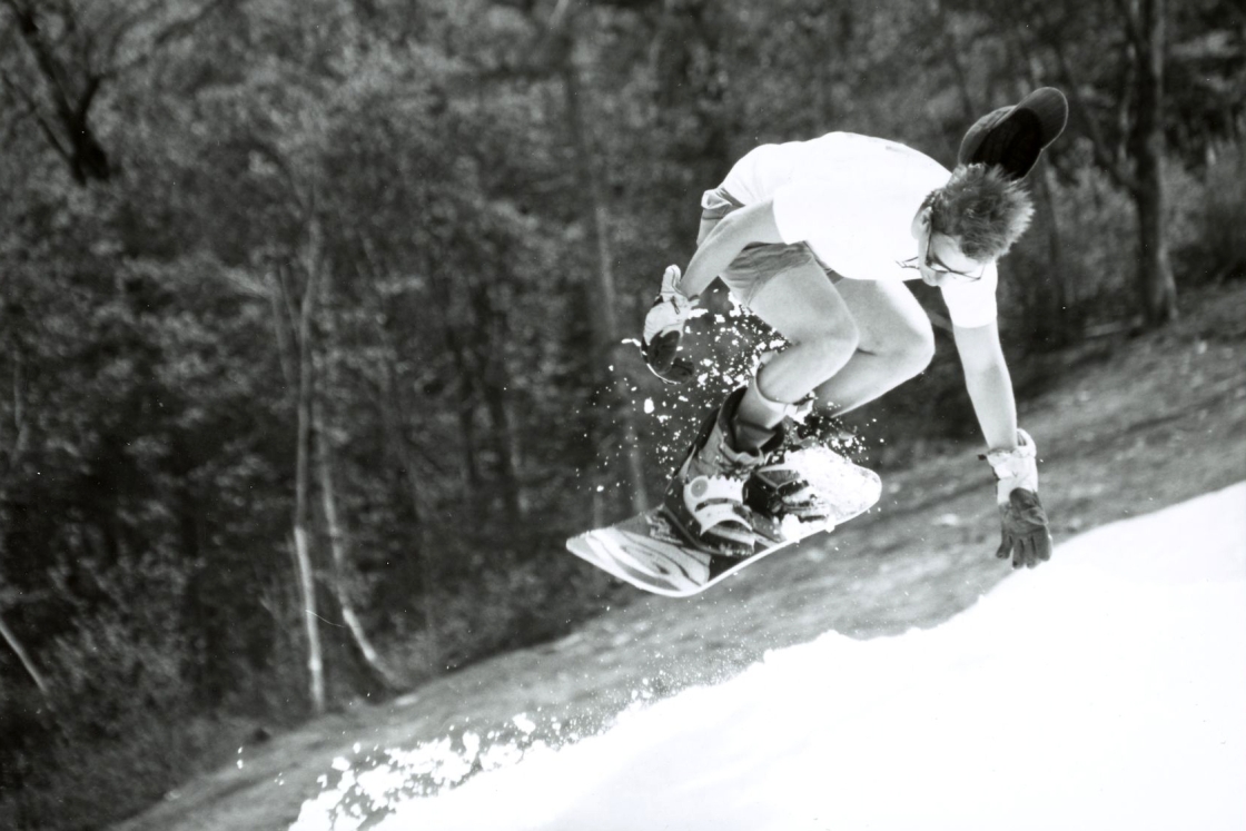 Snowboarder going airborne