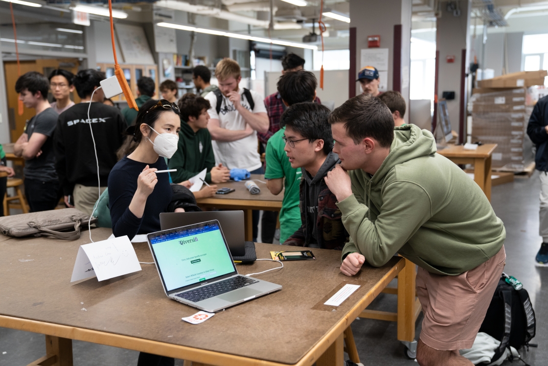 Students competing in HackDartmouth on the Diversifi team