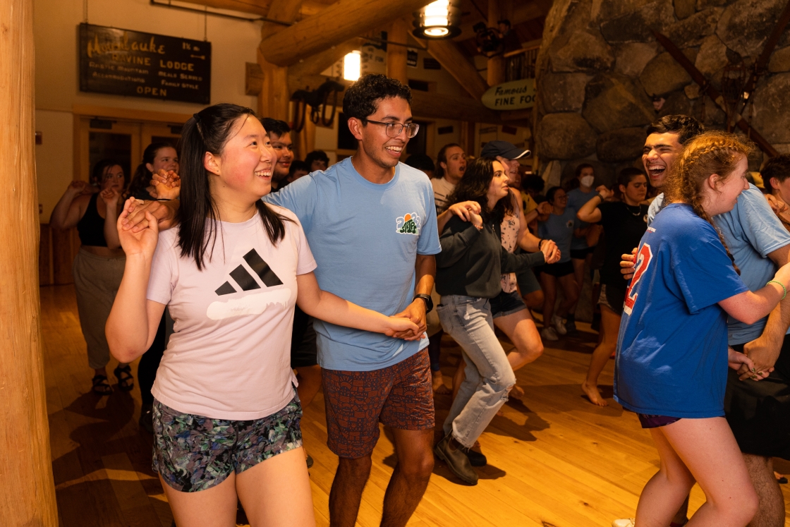 Tripees dancing inside Moosilauke Lodge