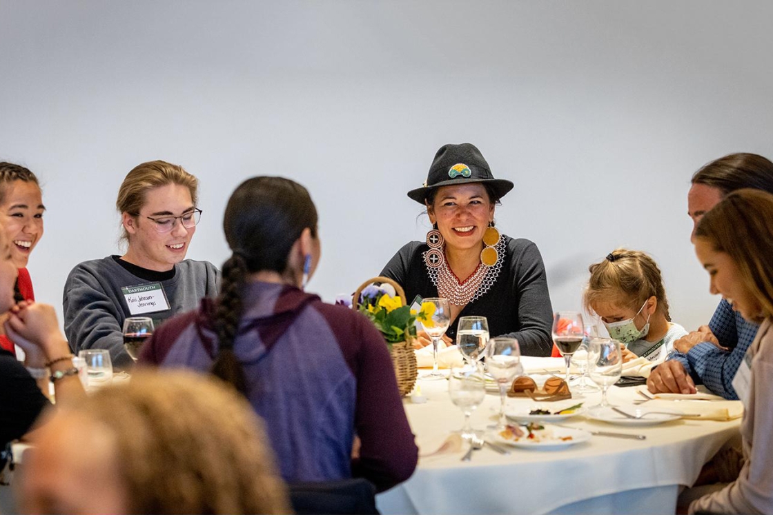 Native Americans seated around a table