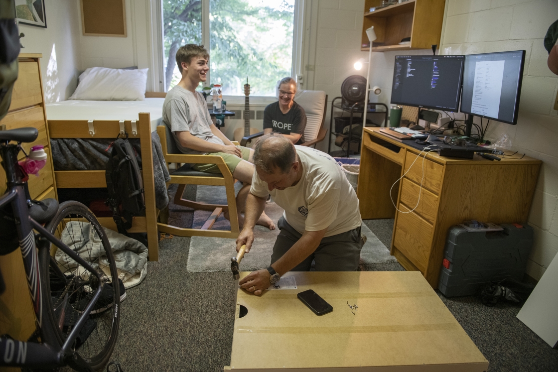 Parent nails desk together