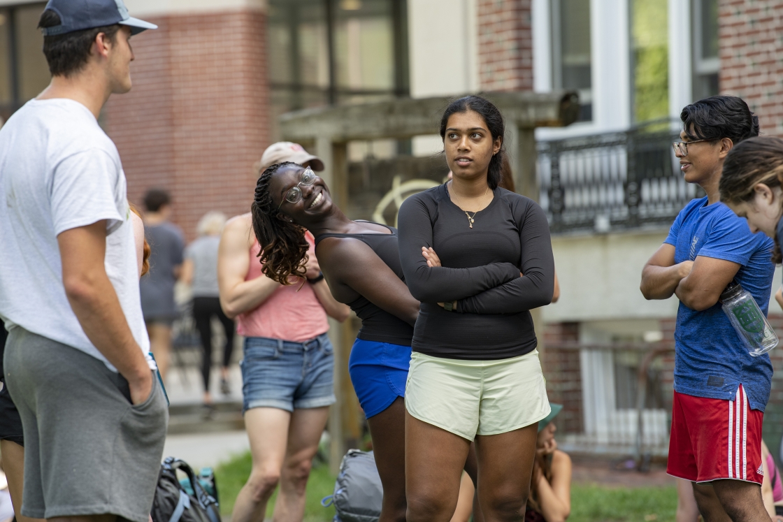 People smile for the camera during student move-in day