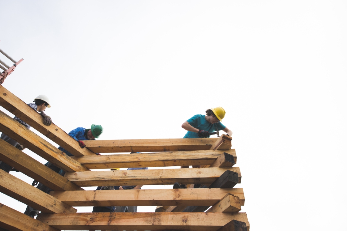 Isaac Mullen '26 nails a top beam into place.