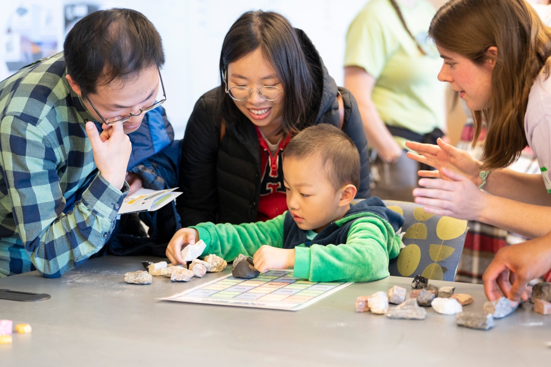 A family enjoys Science Day at the Life Sciences Center.
