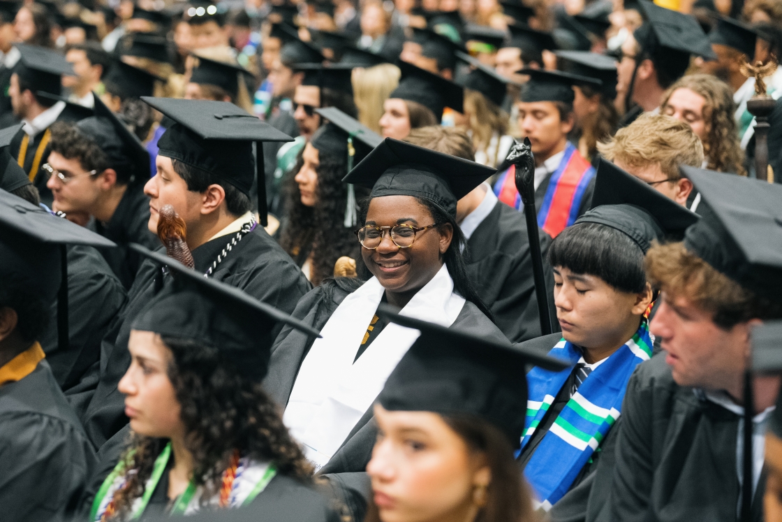 Students listen to speeches at Commencement