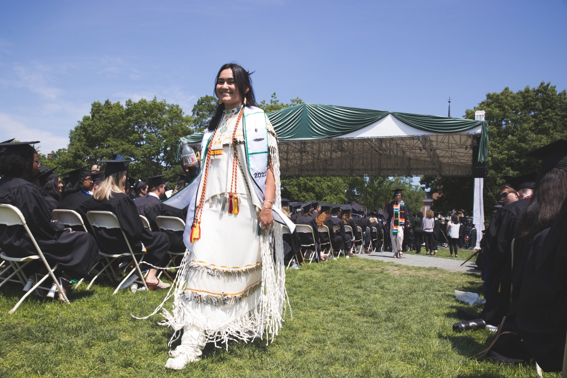 A student walks after graduating from Dartmouth College