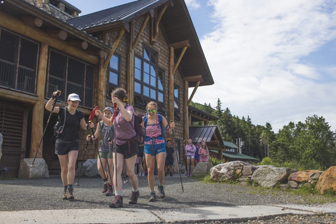Caroline Mahony , Naya Lunney, Dara Casey, and Anna St. Jean hike away from the Ravine lodge