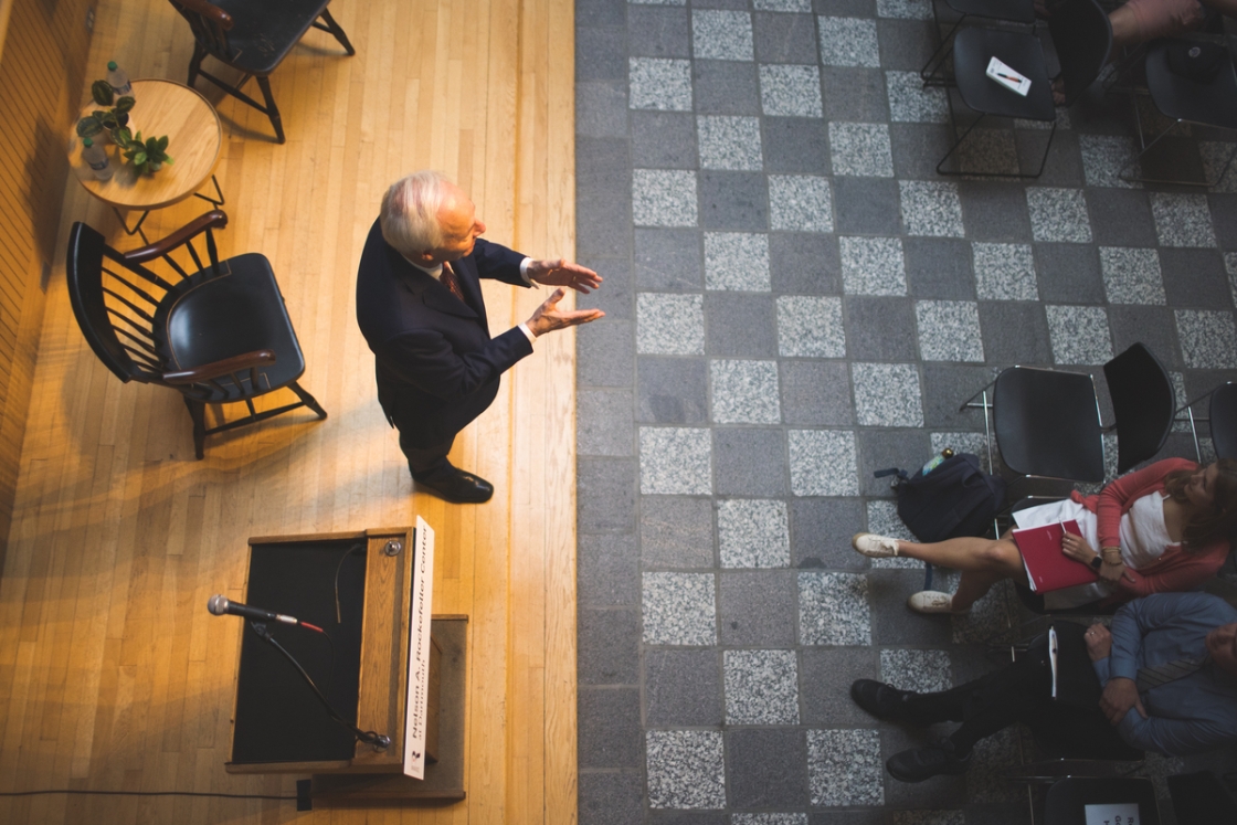 Birds-eye view of Asa Hutchinson delivering talk at Rocky