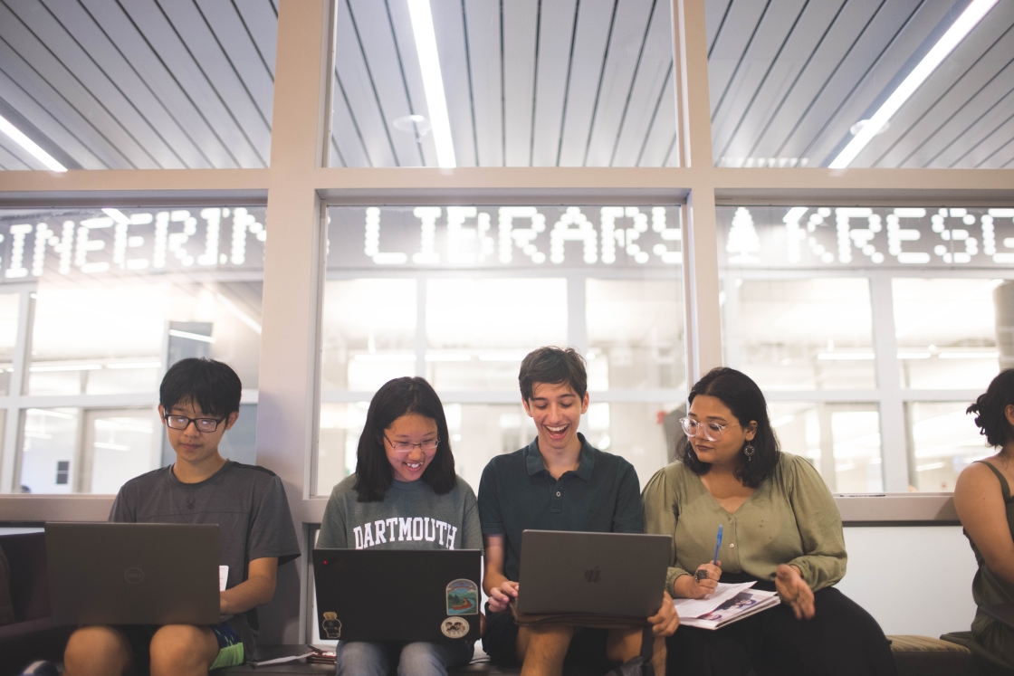 Students peruse course options while they wait for a guidance session.