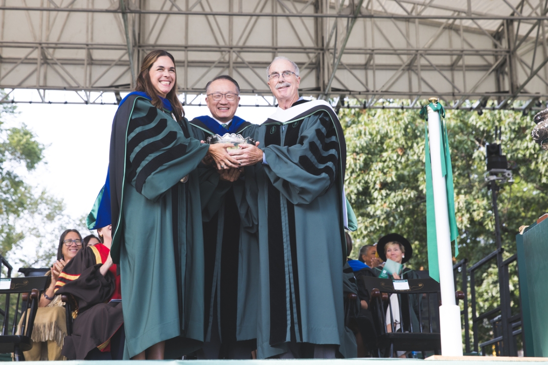 Sian Beilock, Jim Kim, and Philip Hanlon hold the Wentworth Bowl