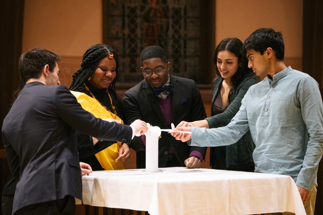 Student speakers light their candles