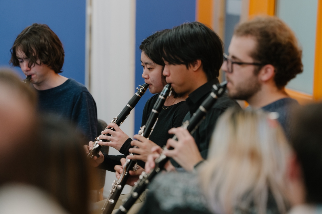 4 clarinetists rehearse for an upcoming recital
