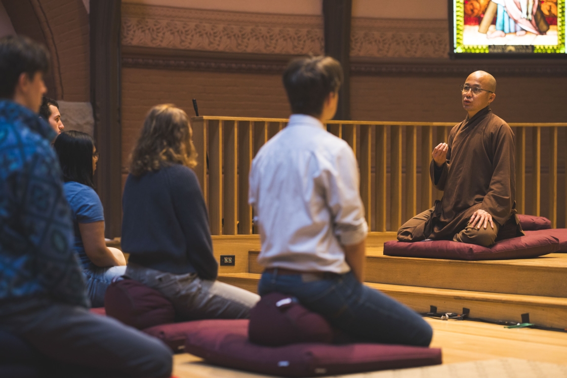 Students practice sitting for meditation