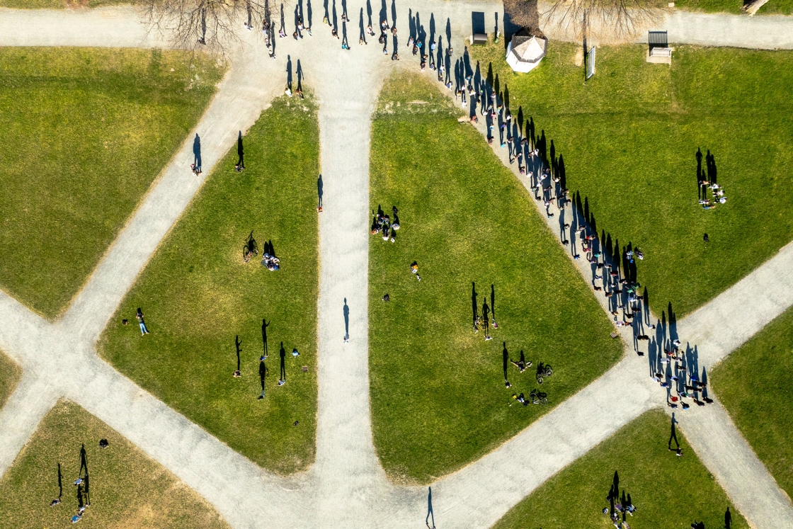 Aerial of monks walking across the Green