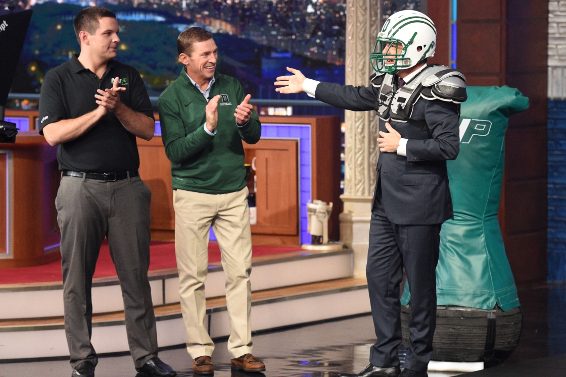 Elliott Kastner '13, Thayer '14, and football coach Buddy Teevens on The Late Show With Stephen Colbert on October 8, 2015.