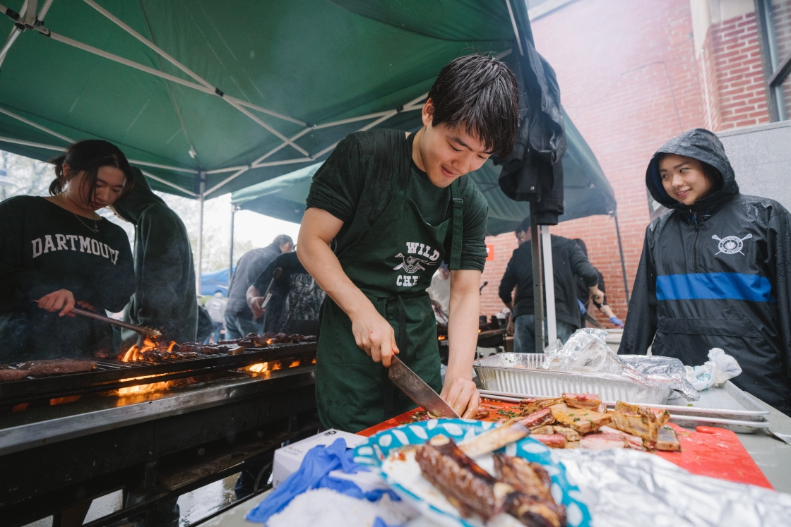 Justin Kim slicing traditional Korean barbeque food