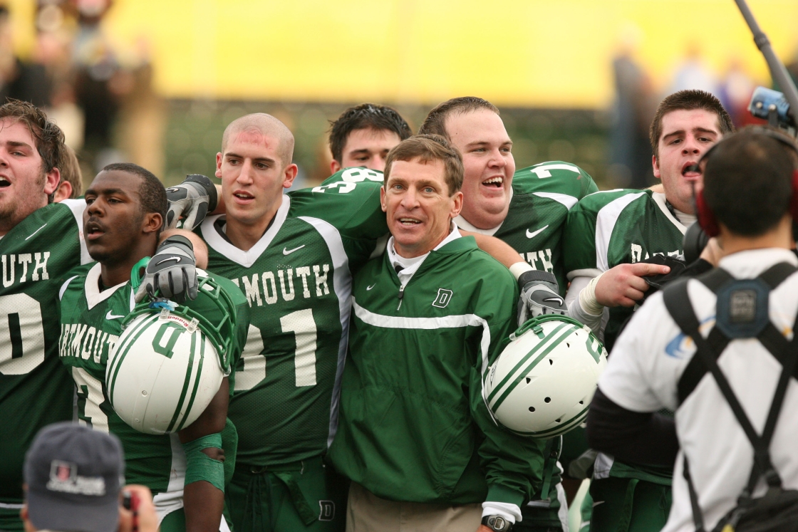 Buddy Teevens sings with Dartmouth Football players