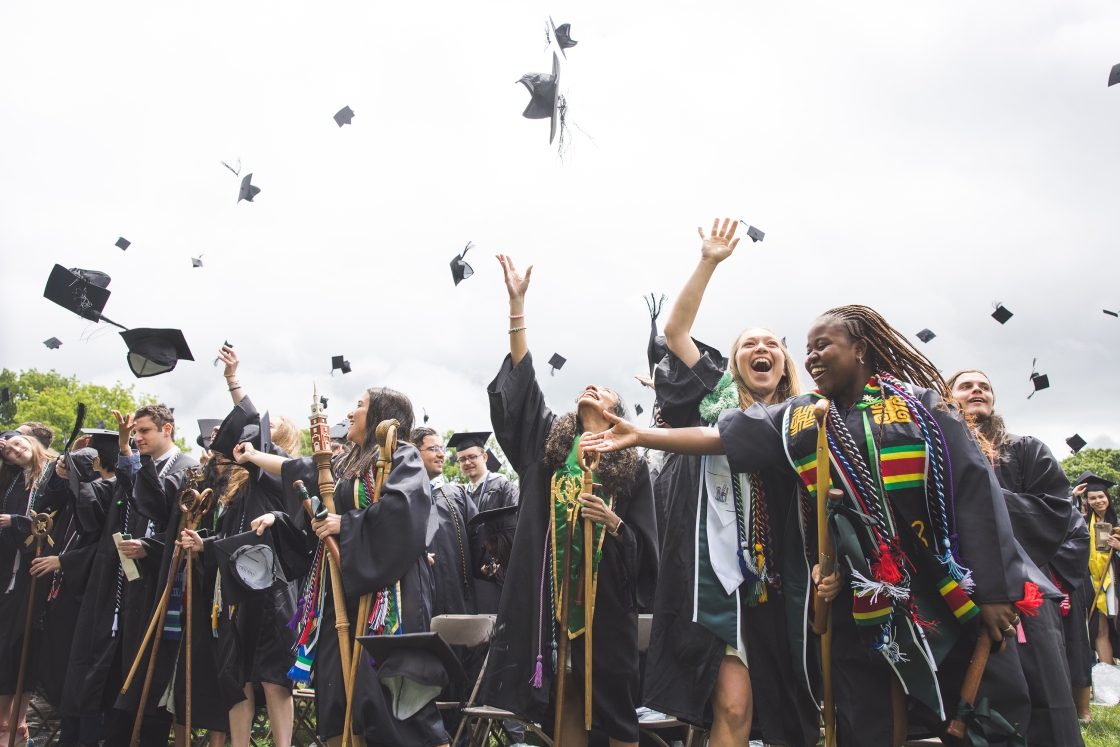Dartmouth graduates throw their hats