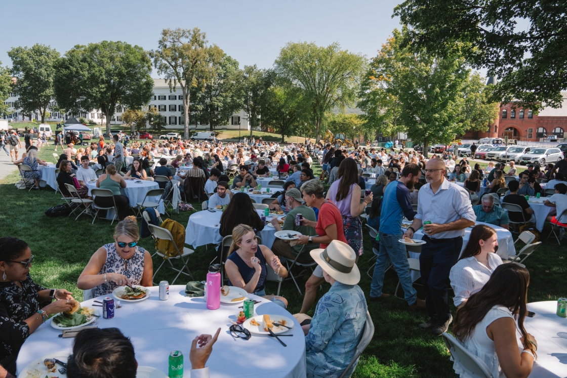 People gathered at tables eating