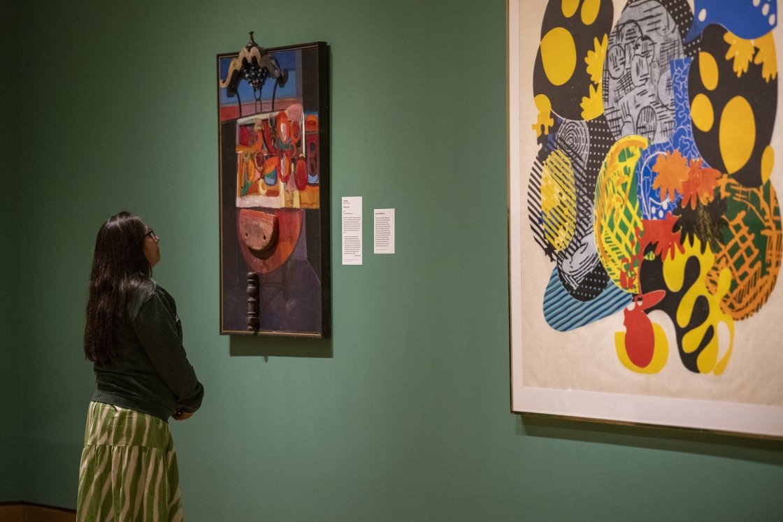 A person looks at art in the Dartmouth Hood Museum