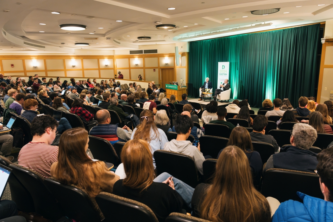 An audience listening to Ben Rhodes talking