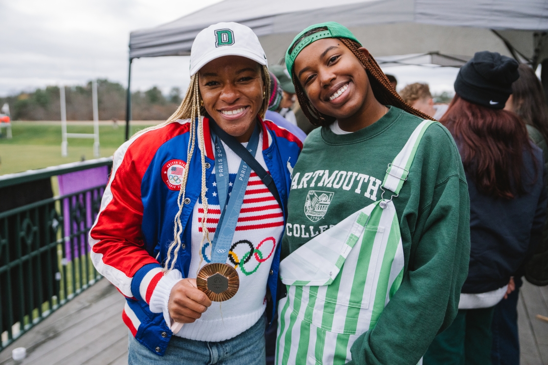 Ariana Ramsey holding Olympic medal