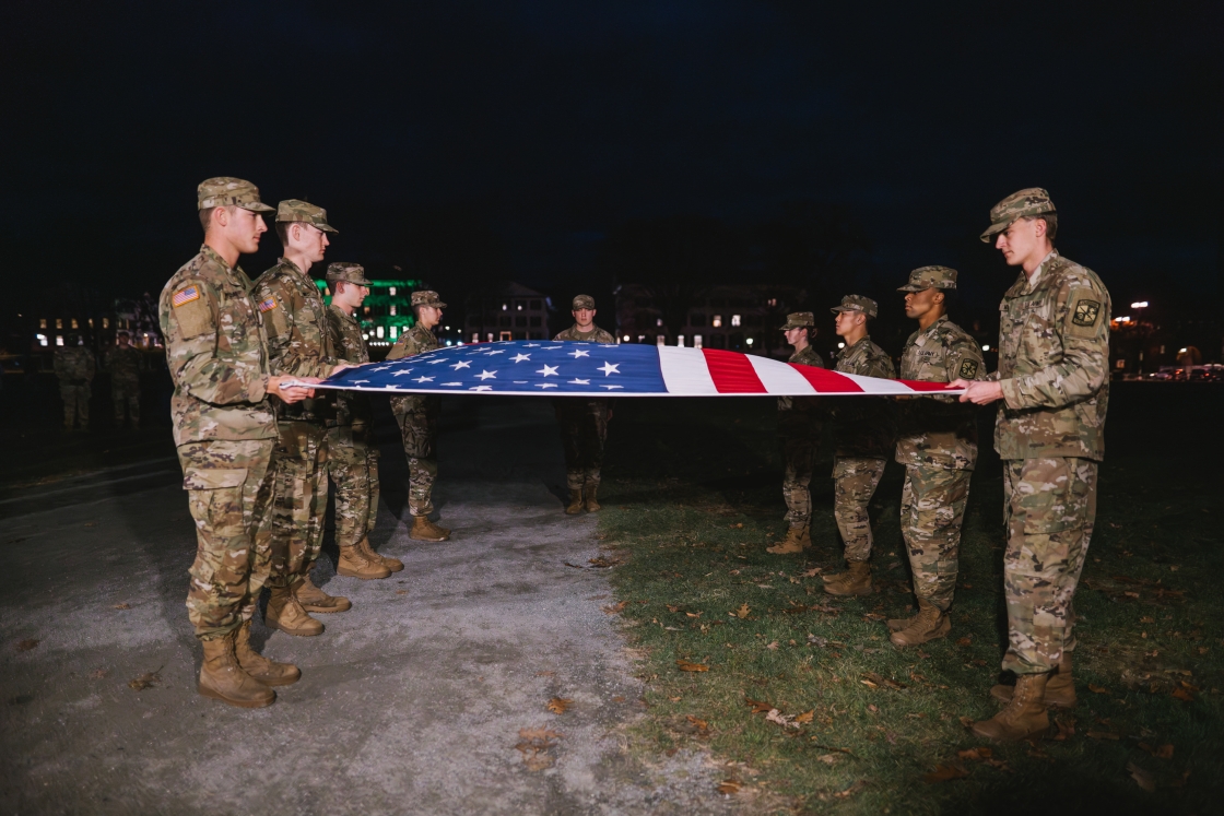 ROTC Cadets holding the U.S. flag