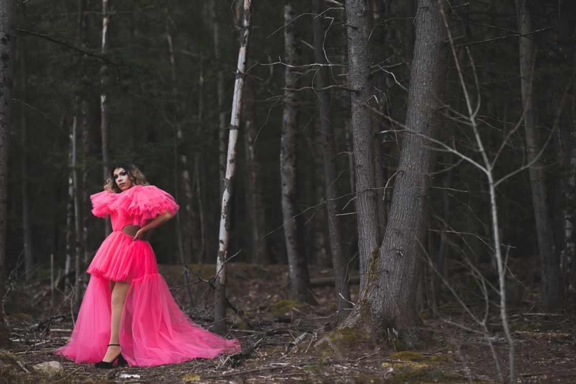 Jaime Aranzabal posing in a flowing pink dress