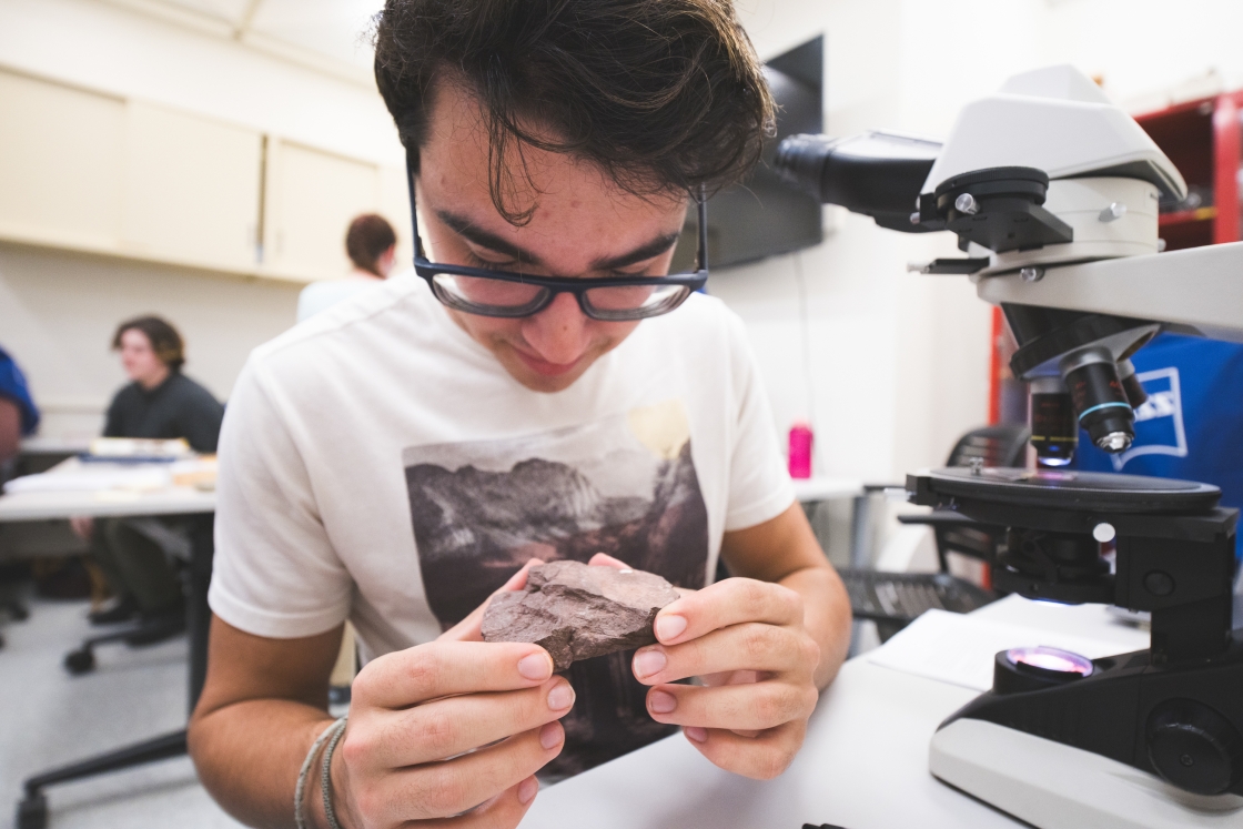 Noah da Silva working on identifying shale in a lab