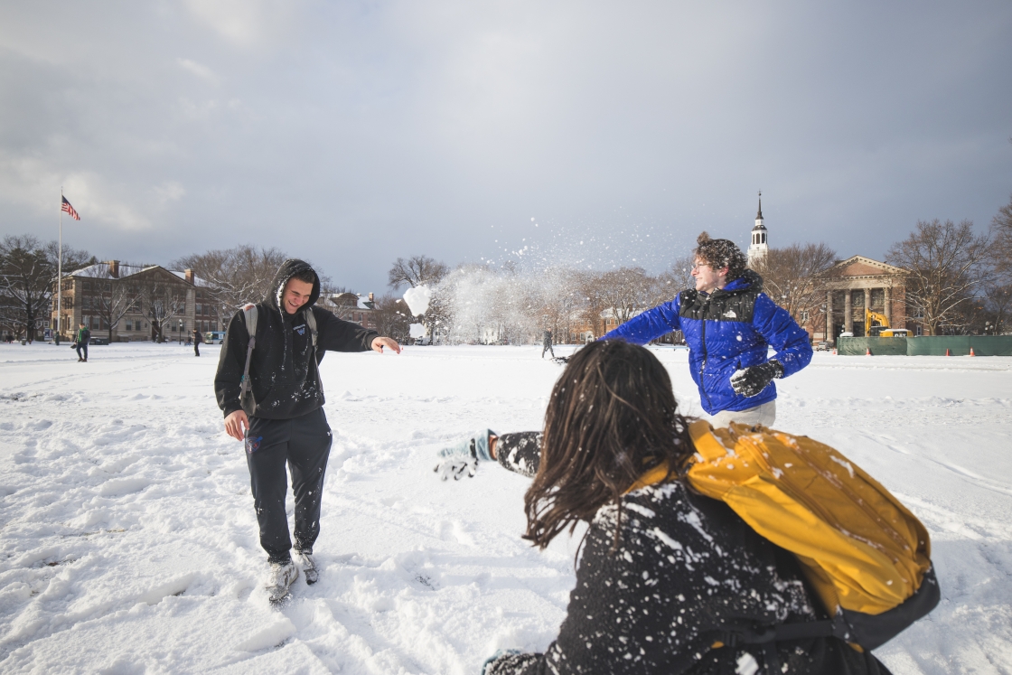 Anthony Piotrowski being playfully pelted by snowballs on the Green.