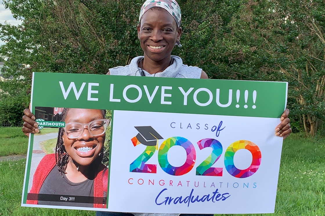 Bianca Jacob's mom holding a poster of congratulations