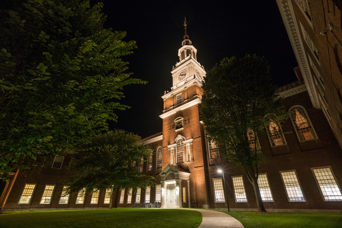 Baker-Berry Library is lit up on a summer night