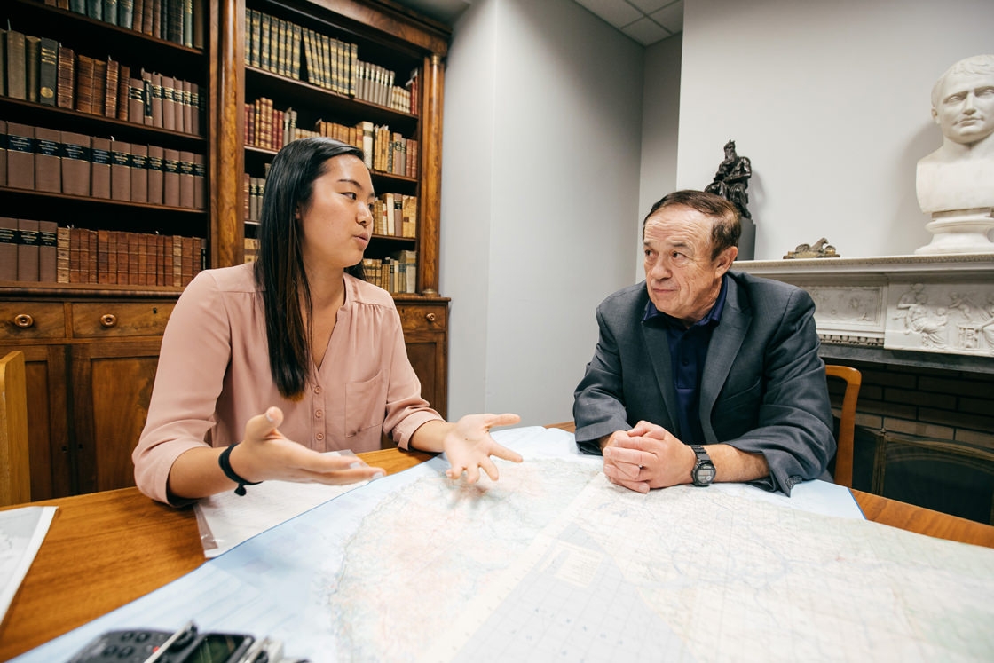 A student works with an alum on an oral history project on the Vietnam War