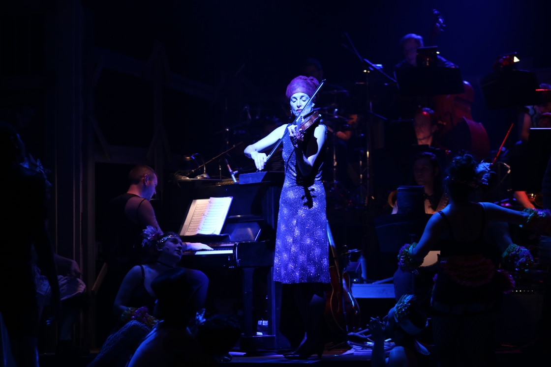 Professor Barbara Will plays in the orchestra at the dress rehearsal for Cabaret