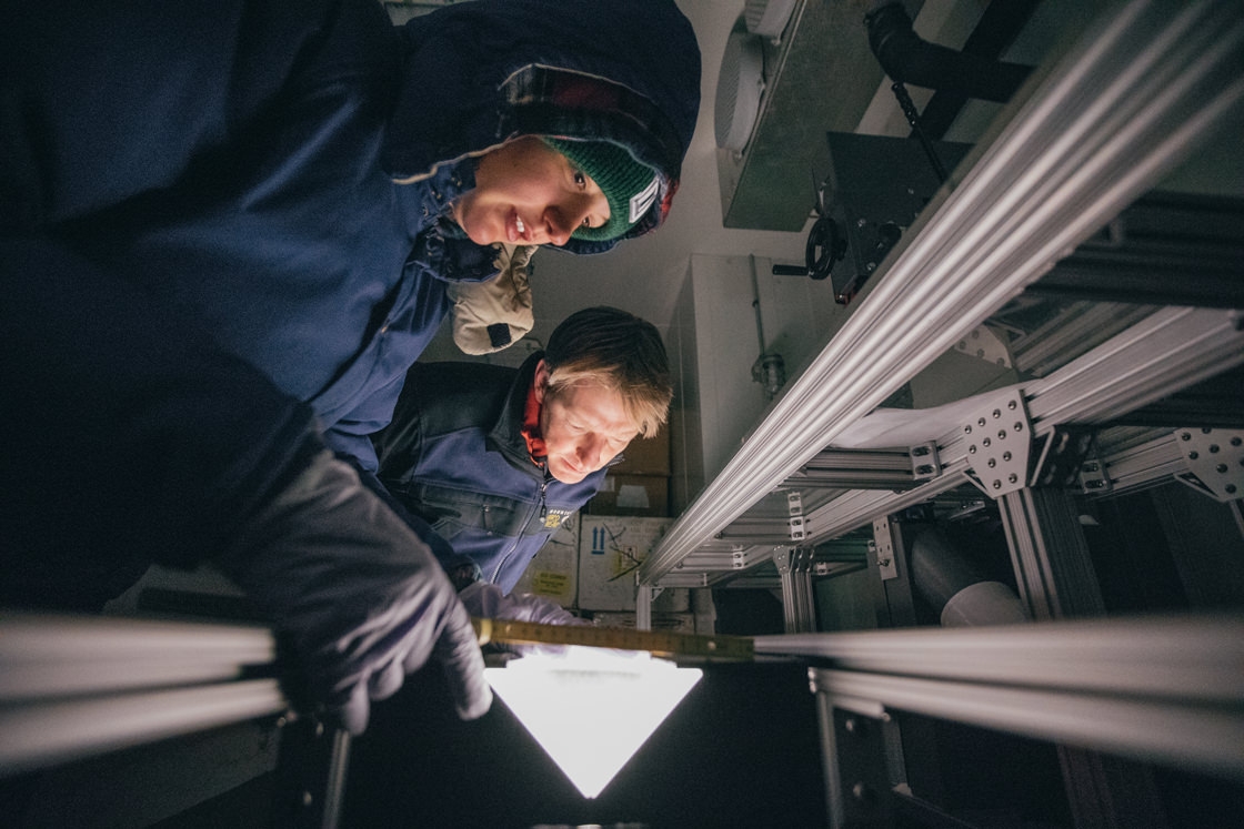 Erich Osterberg and Student Julianne DeAngelo work in ice core lab