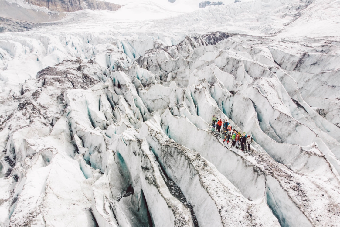 Associate Professor Robert Hawley leads the Stretchies up an icefall, where Athabasca Glacier stretches over a bedrock cliff to form deep crevasses. &quot;It was just an incredible day,&quot; says Berit DeGrandpre ’20.