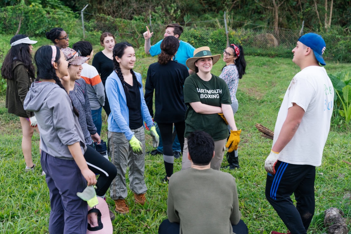 Several days into the trip, students from Harvard's Phillip Brooks House arrived to volunteer at the garden.