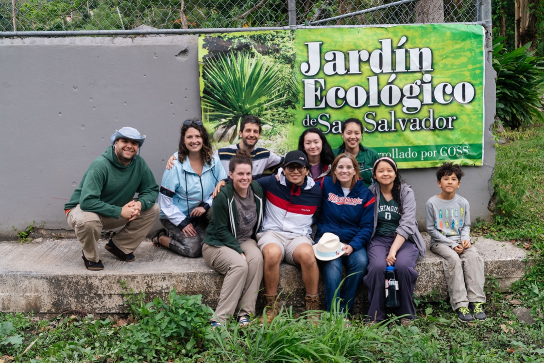 The group poses with Mayor Carmen Yulín Cruz at the community garden.