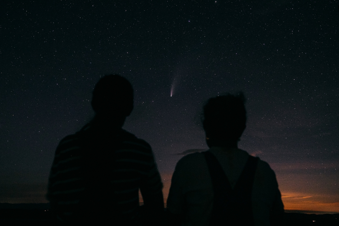 Two people viewing Comet Neowise from atop Gile Mountain