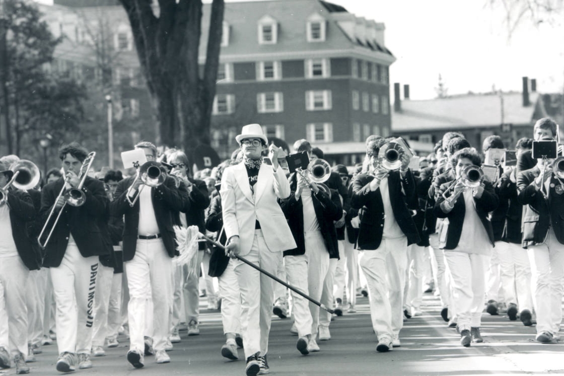 The student marching band leads the alumni parade in October 1987.